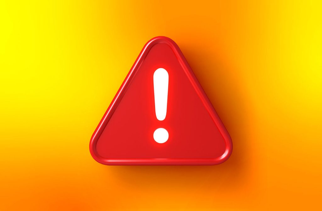 czerwony trójkątny znak "wykrzyknik"