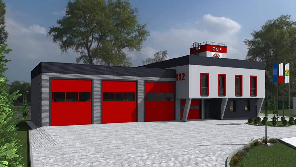 Grafika przedstawia odnowioną remizę strażacką.
